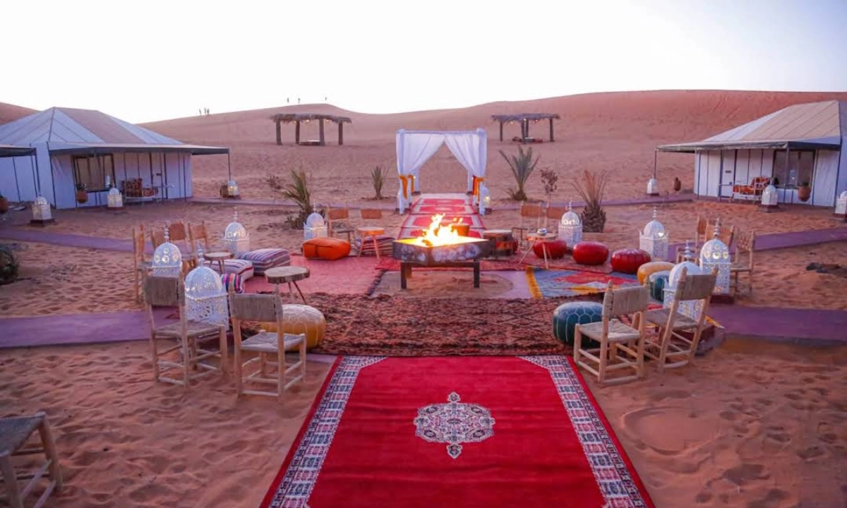 Luxury desert camp at sunset during Marrakech to Fes desert tour
