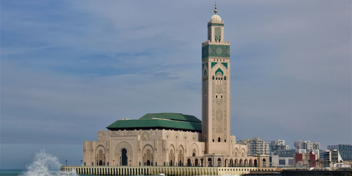 Casablanca Tours 1 Panoramic view of Casablanca with Hassan II Mosque and coastline, starting point of 10 days tour from Casablanca